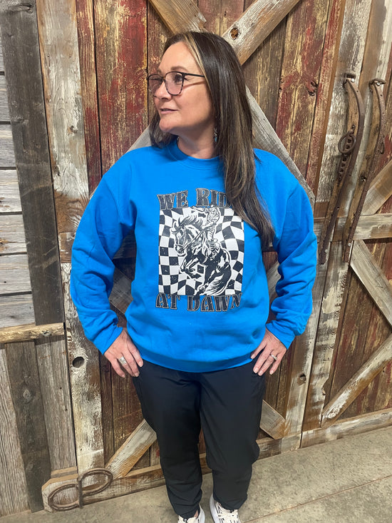 WE RIDE AT DAWN SWEATSHIRT